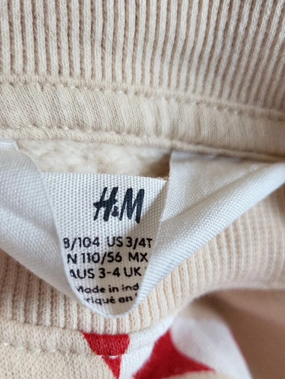 H&M Cream Sweatshirt with Red Candy Cane Motif